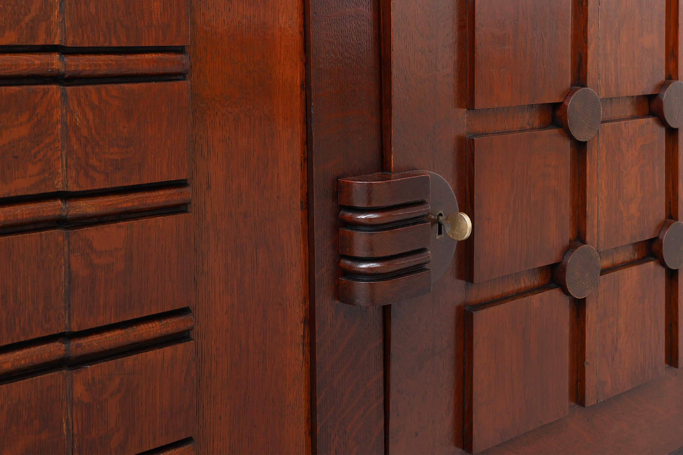 Art Deco carved geometric sideboard by Charles Dudouyt in oak, France ca. 1940thumbnail